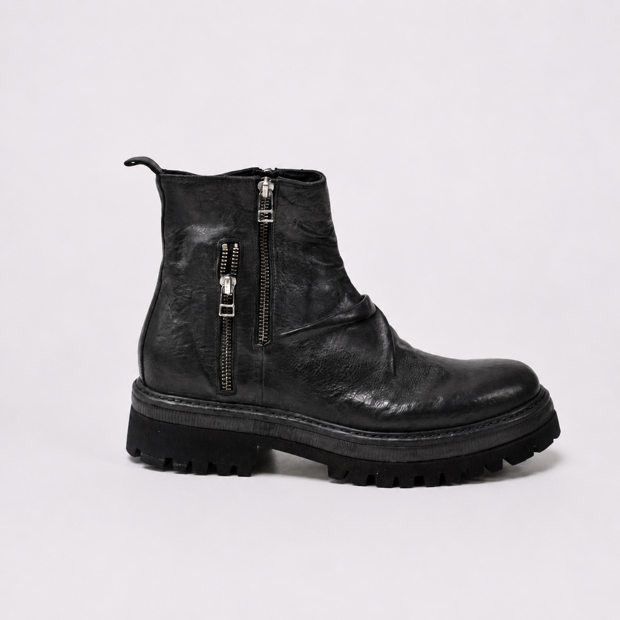 NIKITA ZIPPED BLACK BOOTIES